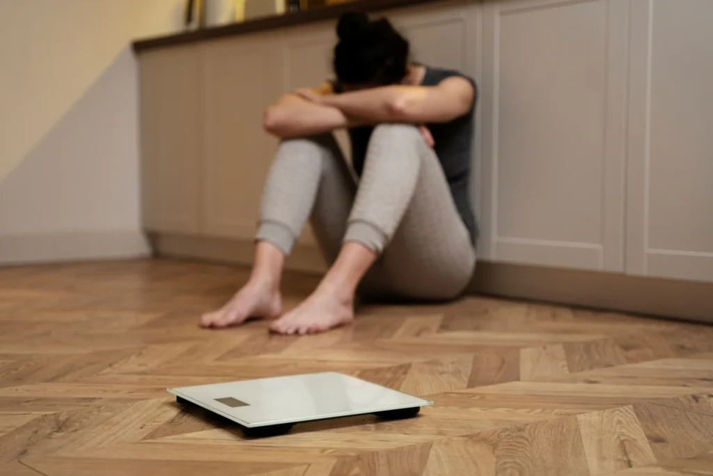 Depression Counseling in Gurgaon 23 woman with eating disorder crying scale scaled 1