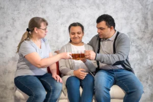 high angle family drinking tea