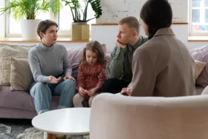 parents kid doing therapy