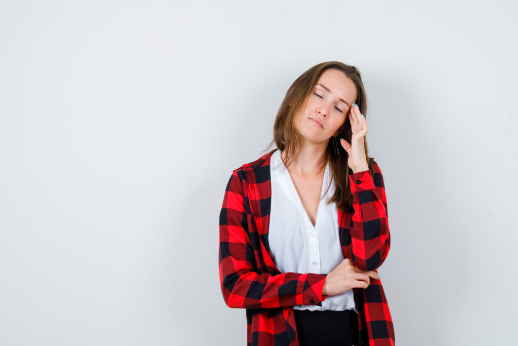 portrait young beautiful female suffering from headache casual outfit looking painful front view