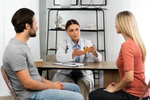 side view couple talking doctor