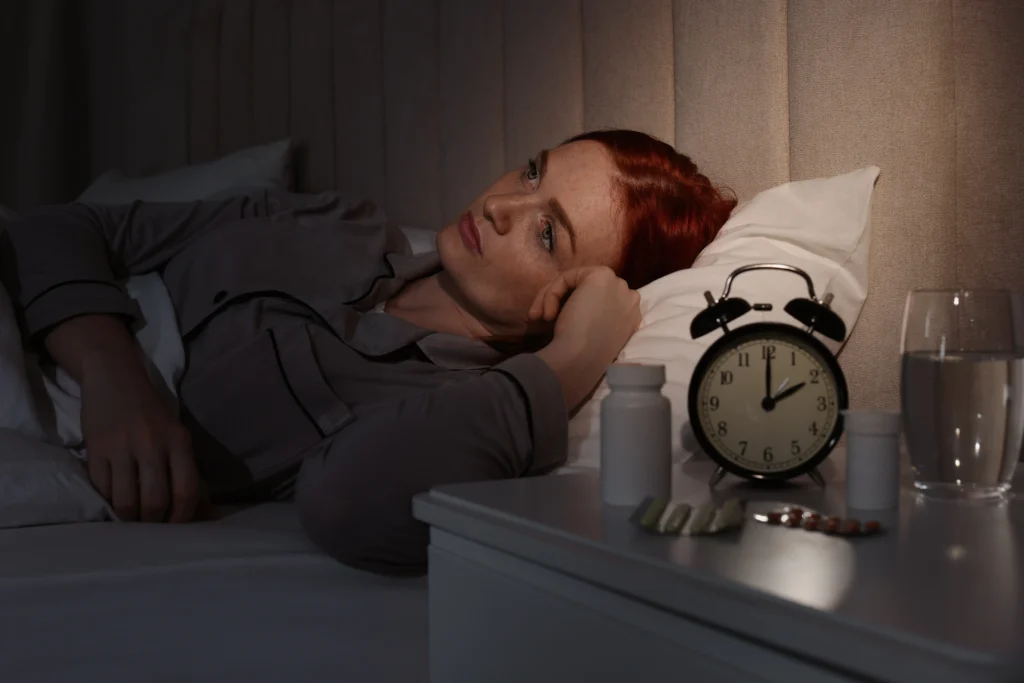 Best Online Sleep Therapy In Gurugram 19 woman suffering from insomnia bed home