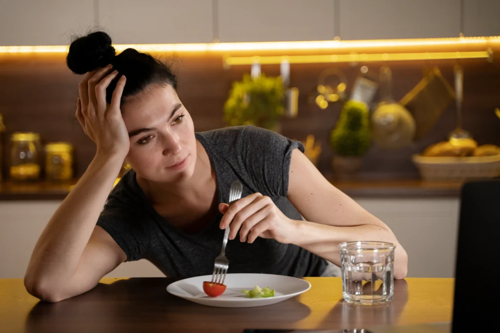 Addiction Counseling in Gurgaon 21 woman trying eat healthy home
