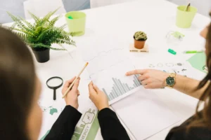 group businesspeople analyzing graph office