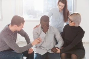 group friends encouraging rehab patient