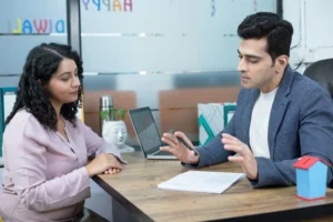 professional insurance agent explaining insurance policy woman