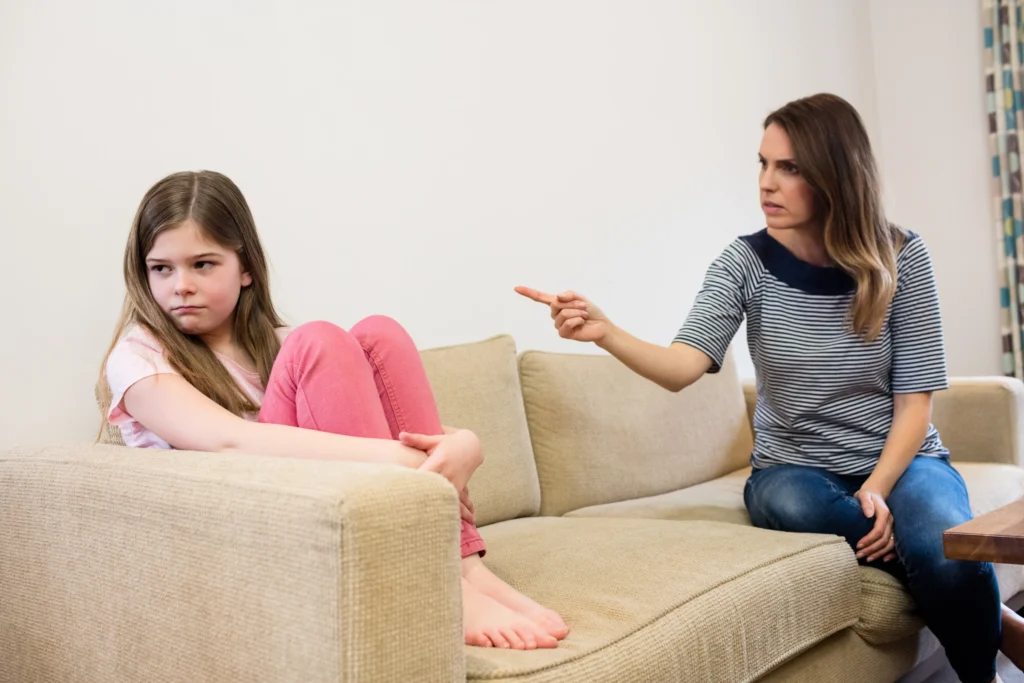 daughter ignoring her mother after argument living room