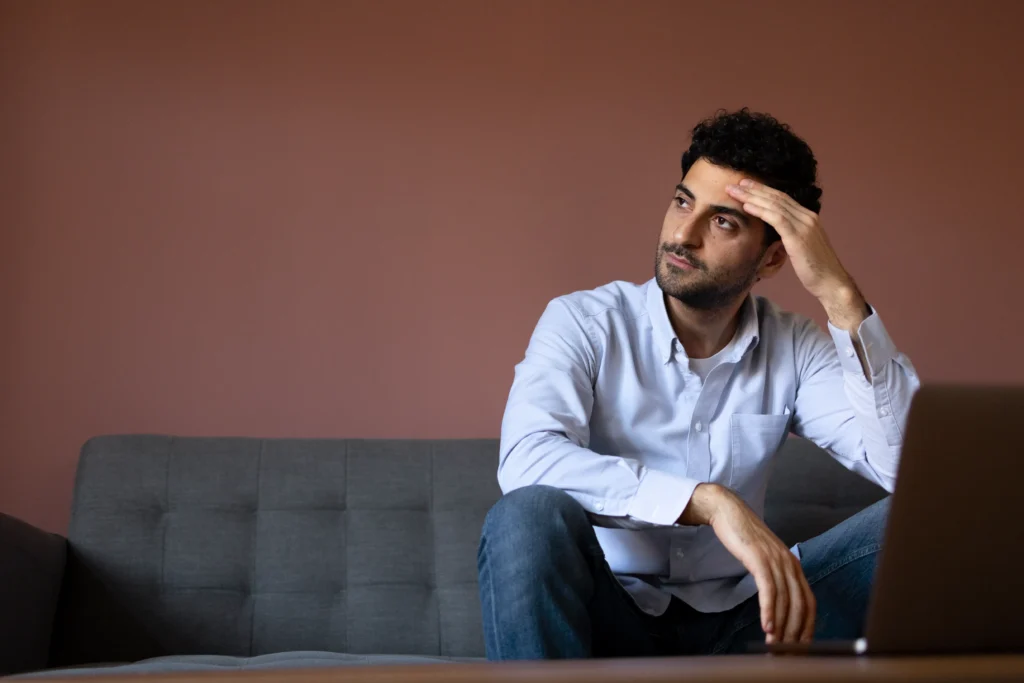 front view anxious man couch