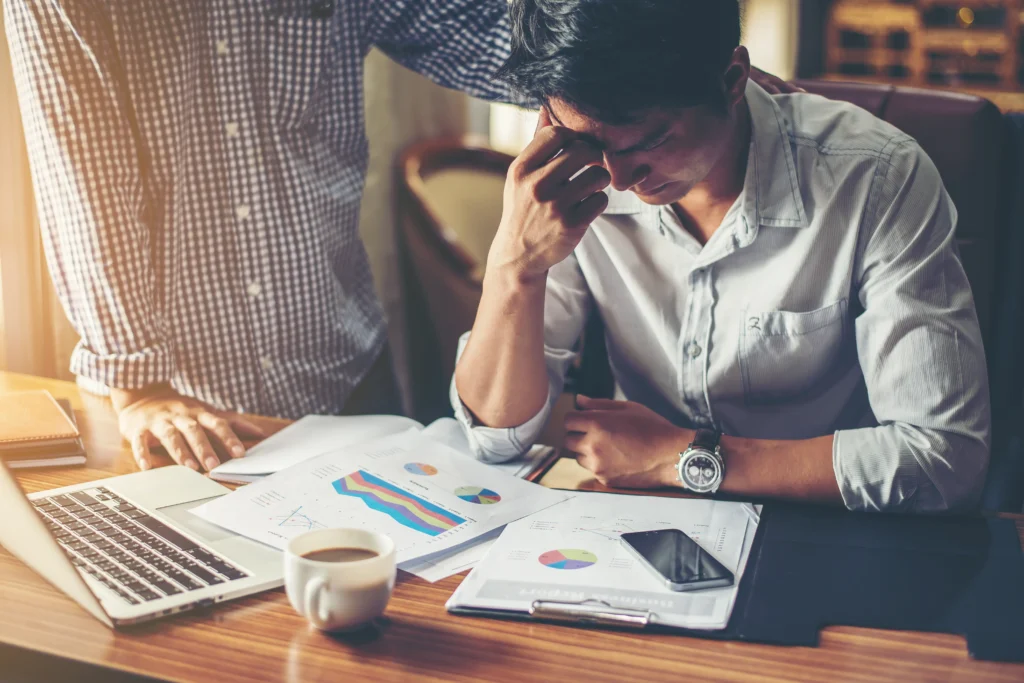 serious young businessman looking financial report seem like