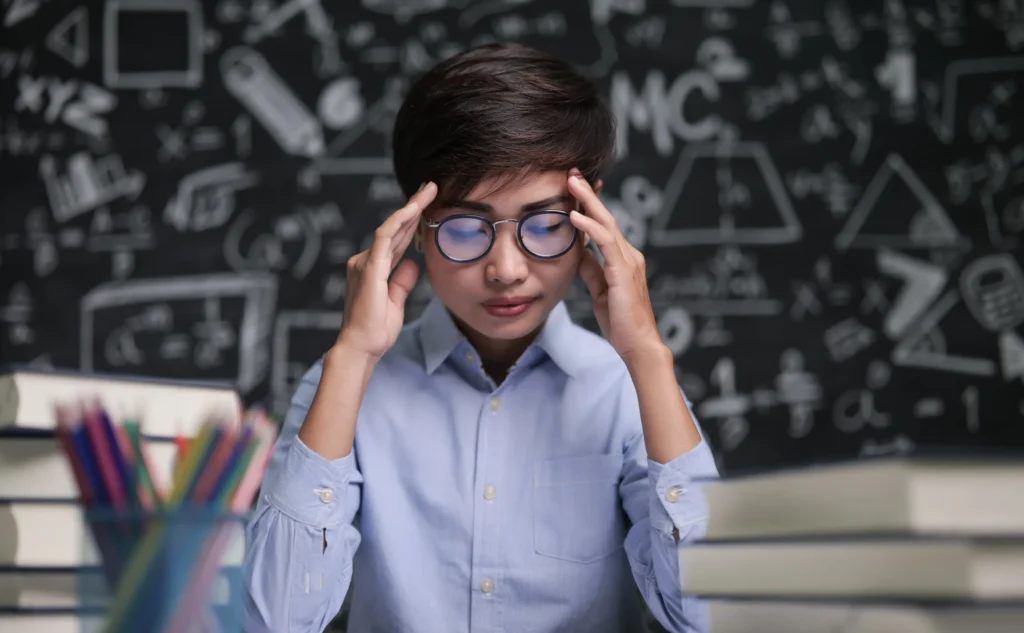 teacher sat thinking about teaching classroom scaled e1758966318347