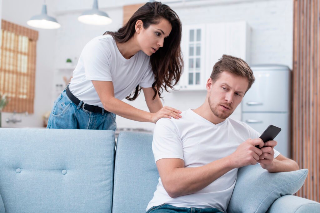 woman arguing with her internet addicted boyfriend