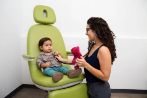 medium shot doctor consulting child