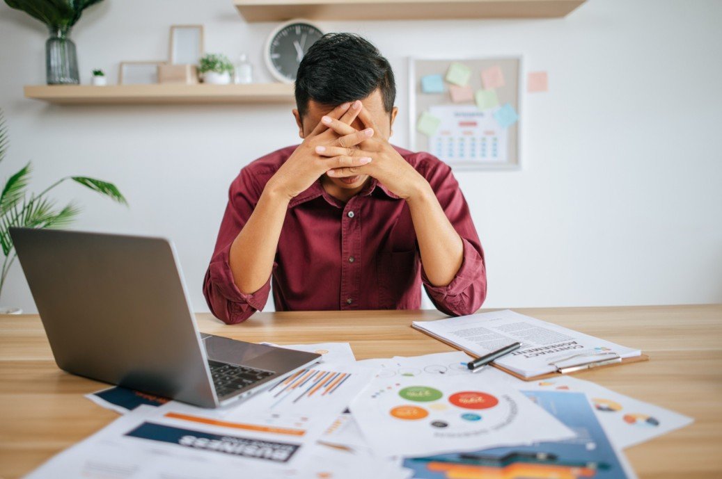man working with laptop